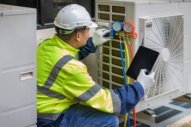Professional Ac Installation technician working in Steilacoom, WA